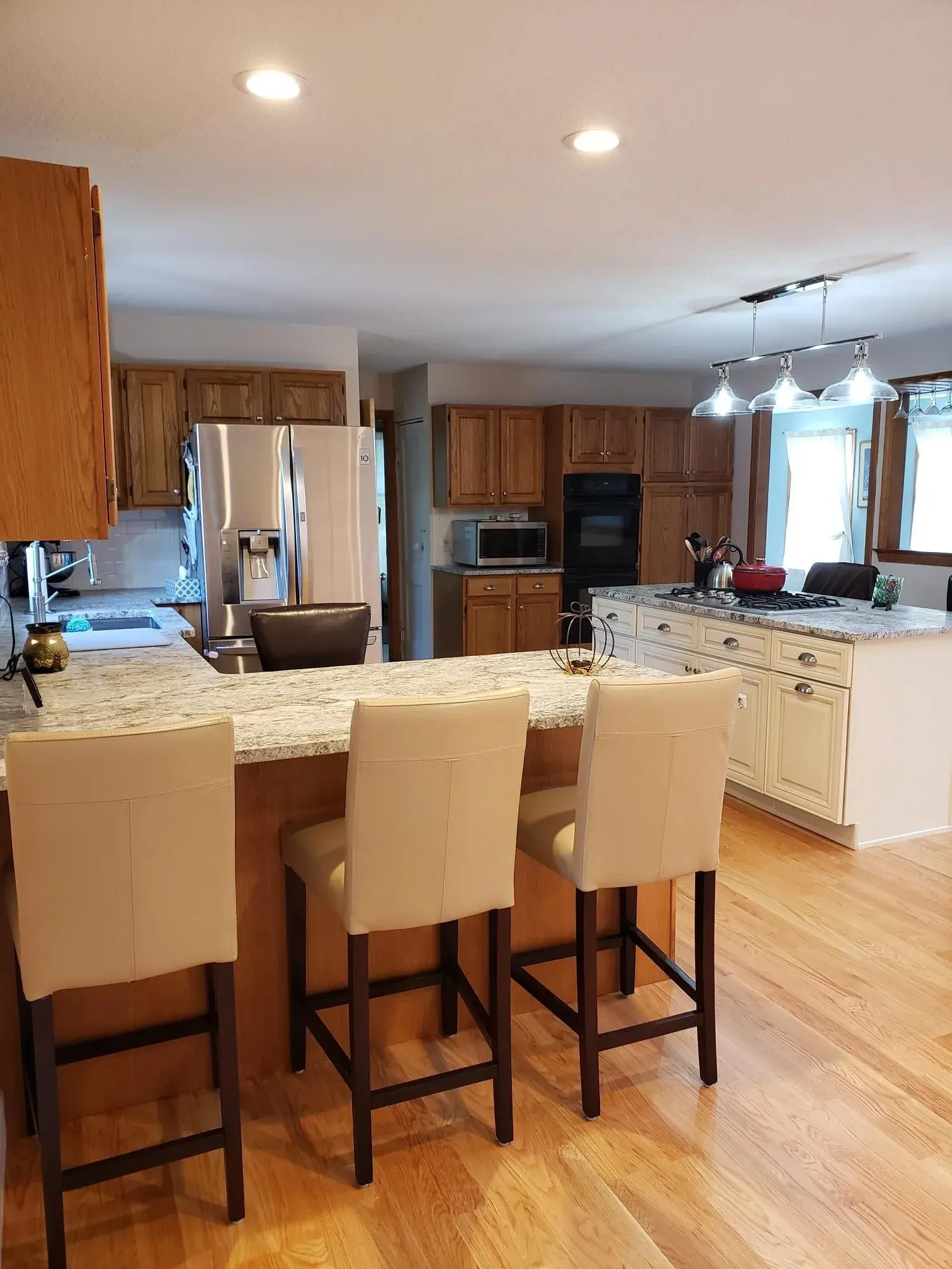 Kitchen with blue dunes granite island